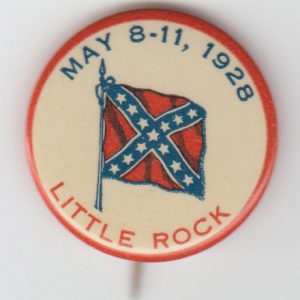 Round button with Confederate battle flag in center and blue and red text