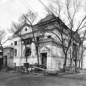 Multistory stone church building with dome on roof