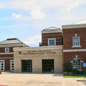 brick building with stone entryway "Arkansas Educational Telecommunications Network"