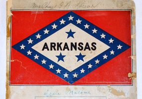 Sheet music with Arkansas state flag on cover