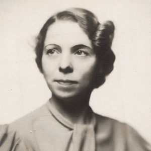 Young white woman with short hair in dress