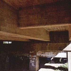 View underneath concrete bridge platform of supporting structures