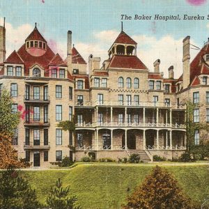 postcard of multistoried light building with gabled roofs and chimneys "The Baker Hospital Eureka Springs Arkansas"