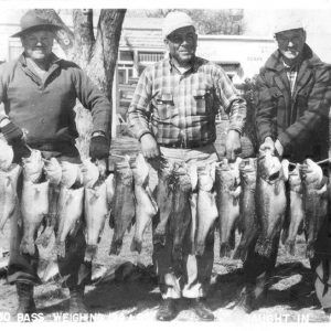 White men holding fish