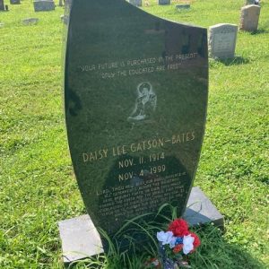 Grave monument with portrait of African-American woman on it and engraving in cemetery