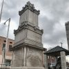 Multitiered castle like monument with engraved top and base panels