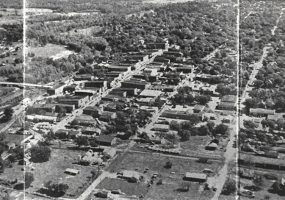 Town buildings and homes on streets from above