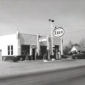 Service station with car alongside road