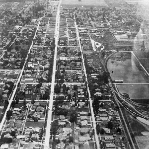 Houses and town buildings with street grid as seen from above