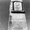 Stone monument with Masonic symbols and funereal inscription