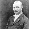 Older African-American man in suit and bow tie