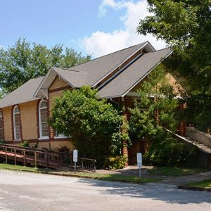 Brick church building with wheelchair ramp on side