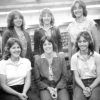 Group of six white girls in library