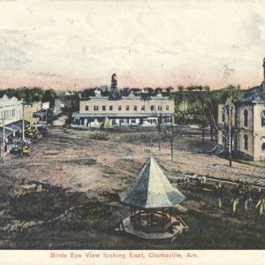 Town square surrounded by multistory buildings with gazebo in the foreground