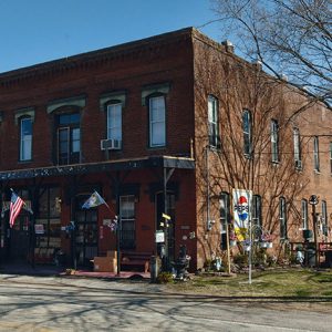 Two-story storefront building on street