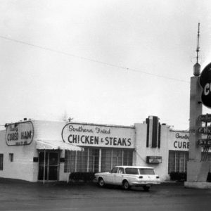 small white building advertising "Southern Fried Chicken and Steaks"