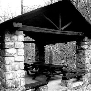 Pavilion with brick columns and picnic tables