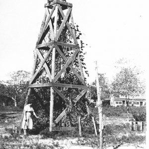 White woman and wooden bell tower