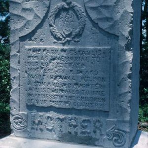 Wreath and plaque on "Mother" stone monument