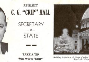 White man in suit and capitol building on campaign flyer saying "Re-elect C.G. Crip Hall secretary of state take a tip win with crip"