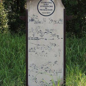 "Celebrating early horse racing in the Bear State 1835 to 1875" stone monument with horse drawings on it