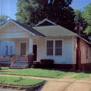 Single-story house with Dutch gable roof and covered porch