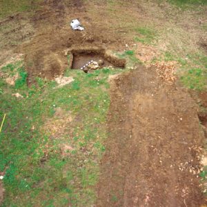 Aerial view of excavation sites showing the corners of a former courthouse