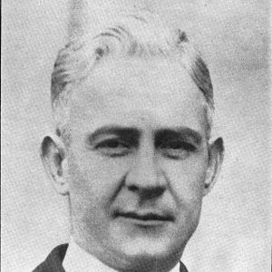 White man wearing suit