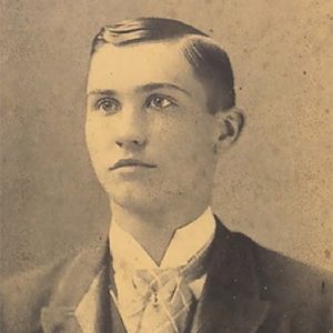 Young white man in suit and tie