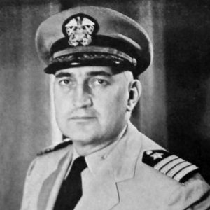 White man in military uniform with cap