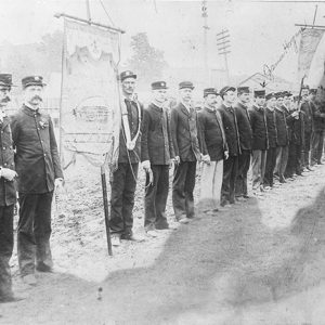 White men in uniforms with flags