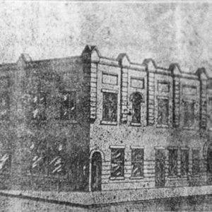 Two-story brick building on street