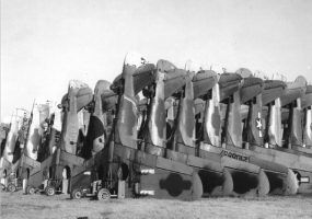 Rows of airplanes stacked on their noses