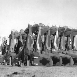 Rows of airplanes stacked on their noses