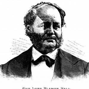 White man with beard in suit and bow tie