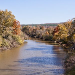 River with autumn trees on both sides