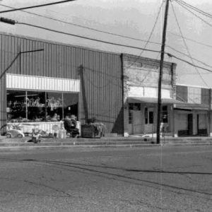 Storefront buildings with curb steps on street corner