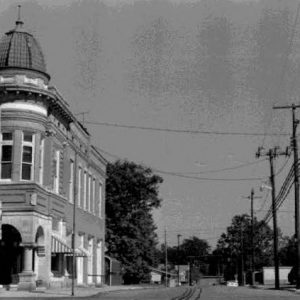 Multistory building with dome on street corner