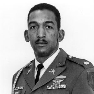 African-American man with mustache in military uniform