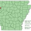 Arkansas map with red dot in Crawford County and explanation in green text