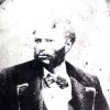 African-American man in suit and bow tie