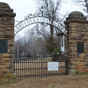 Cemetery gates with brick columns and arched sign "Confederate Cemetery"