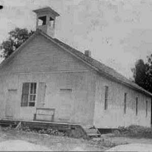 White church building with bell tower