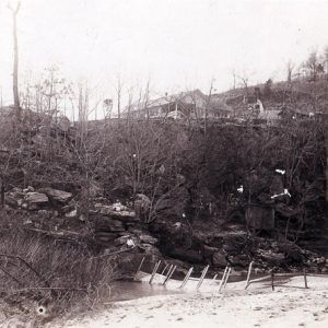 House on a cliff as seen from below