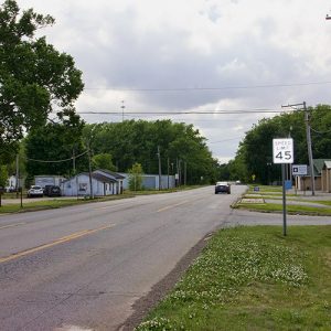 Single-story buildings on multilane rural road