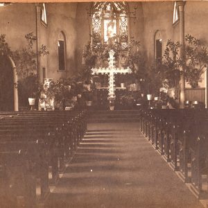 interior of church, with nave and cross visible