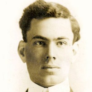 Young white man in suit and tie