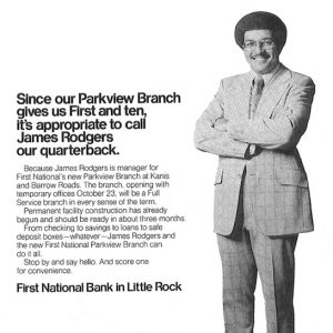 smiling African-American man in suit and glasses on First National Bank flyer