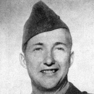 Young white man smiling in military uniform with cap