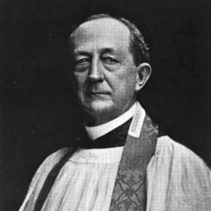 White man standing in bishop's vestments